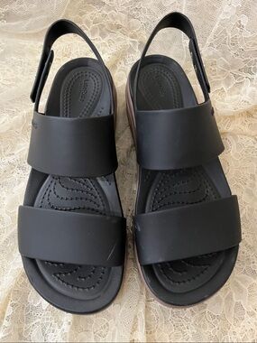 Crocs Brooklyn low wedge size 6. Black/ mushroom colorway. Silver accents.